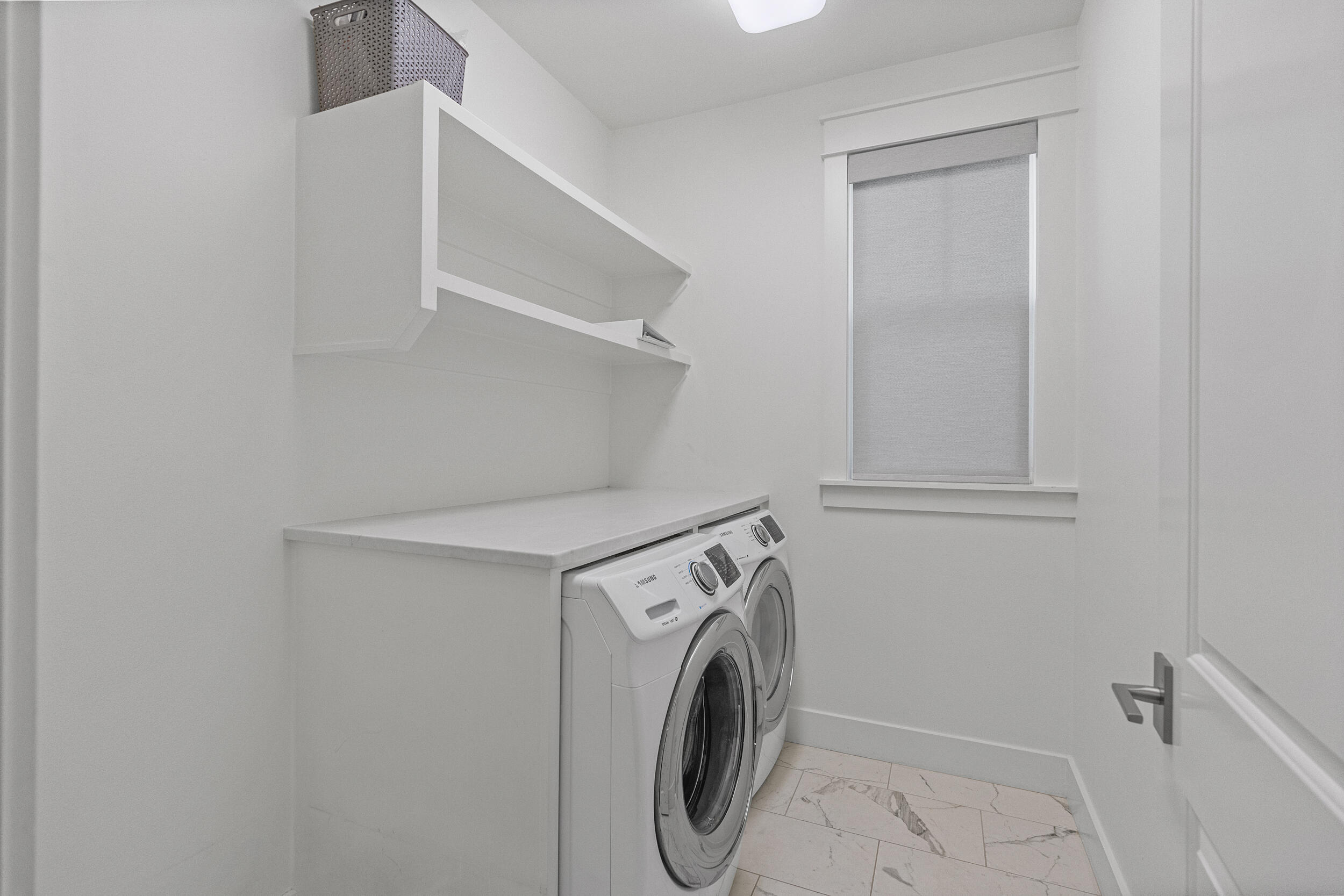 77 Cannonball Lane, Unit LOT (174) Inlet Beach, FL 32461 - Photo 18 of 46 a utility room with dryer and washer