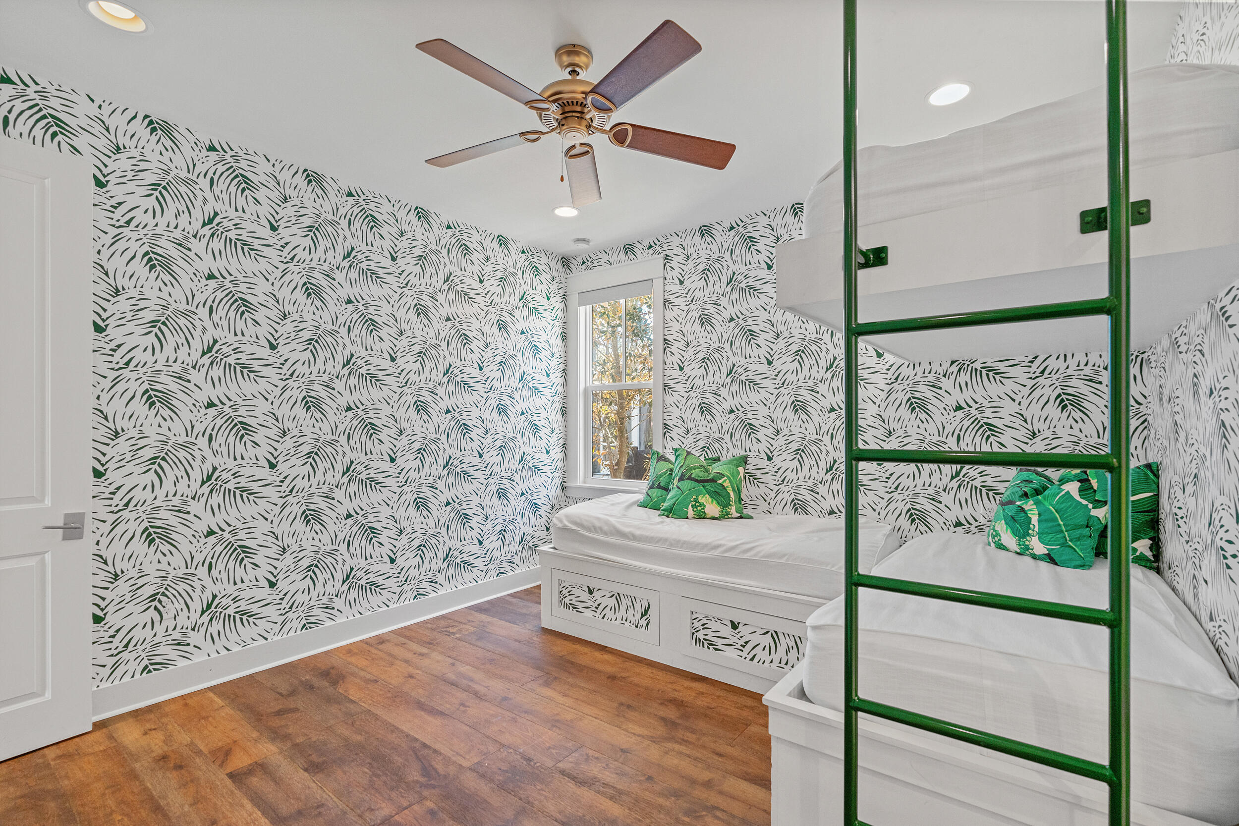 77 Cannonball Lane, Unit LOT (174) Inlet Beach, FL 32461 - Photo 23 of 46 a view of a hallway with wooden floor and a ceiling fan