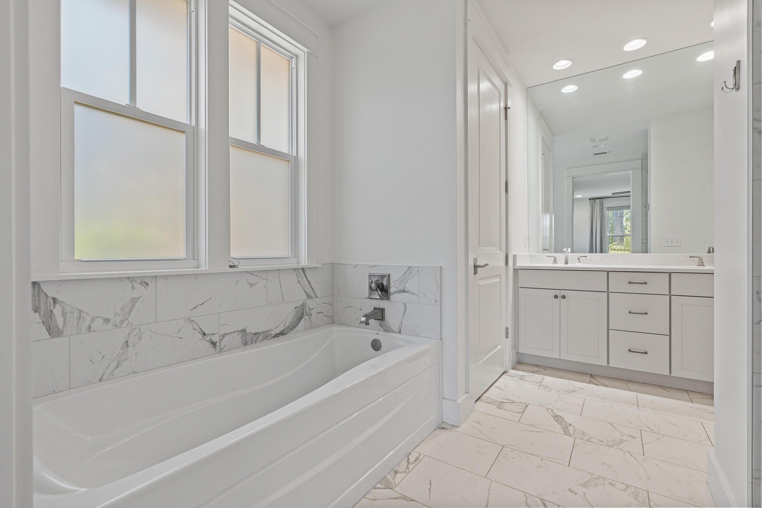 77 Cannonball Lane, Unit LOT (174) Inlet Beach, FL 32461 - Photo 28 of 46 a bathroom with a bathtub and a sink