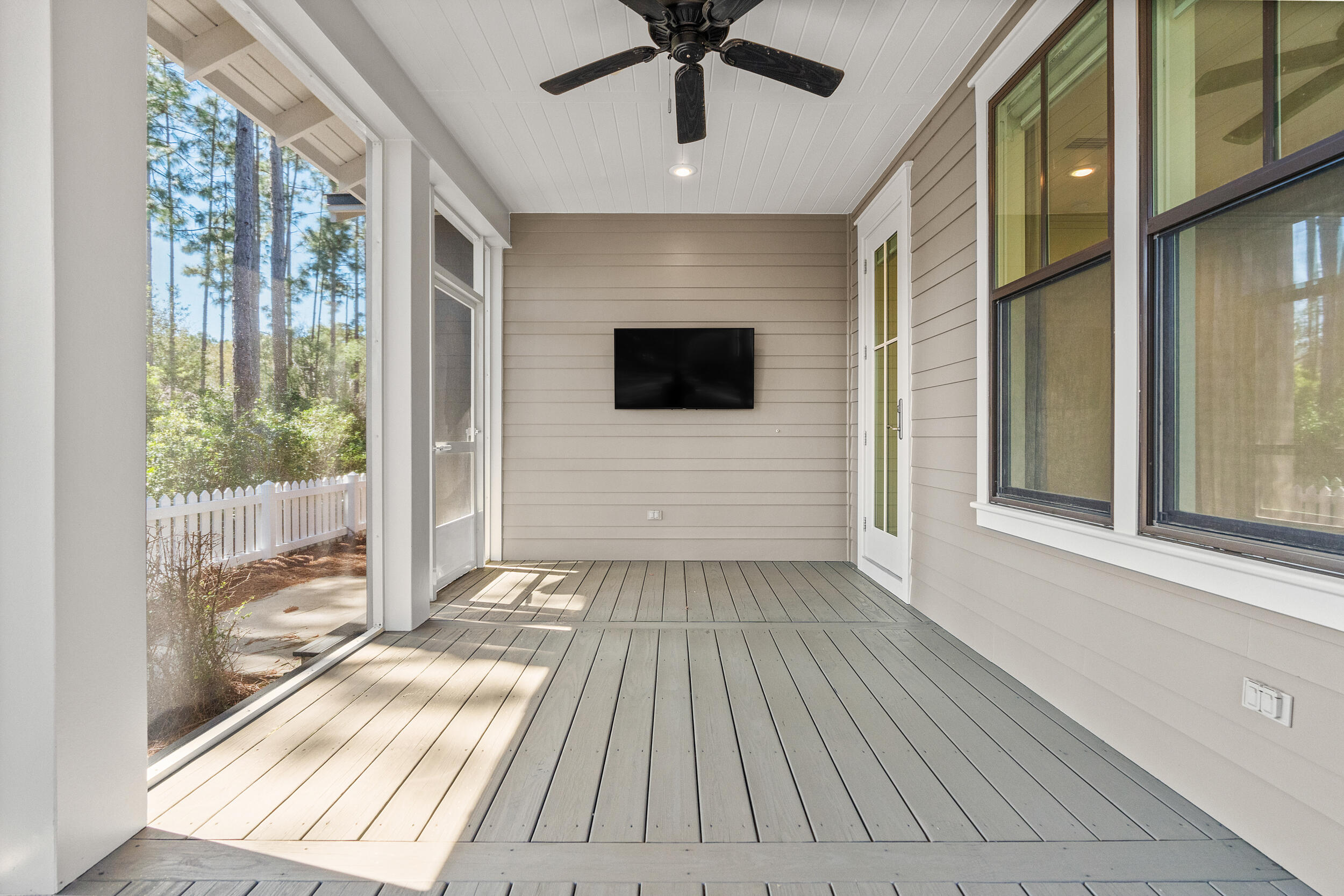 77 Cannonball Lane, Unit LOT (174) Inlet Beach, FL 32461 - Photo 34 of 46 a view of a livingroom with a floor to ceiling window