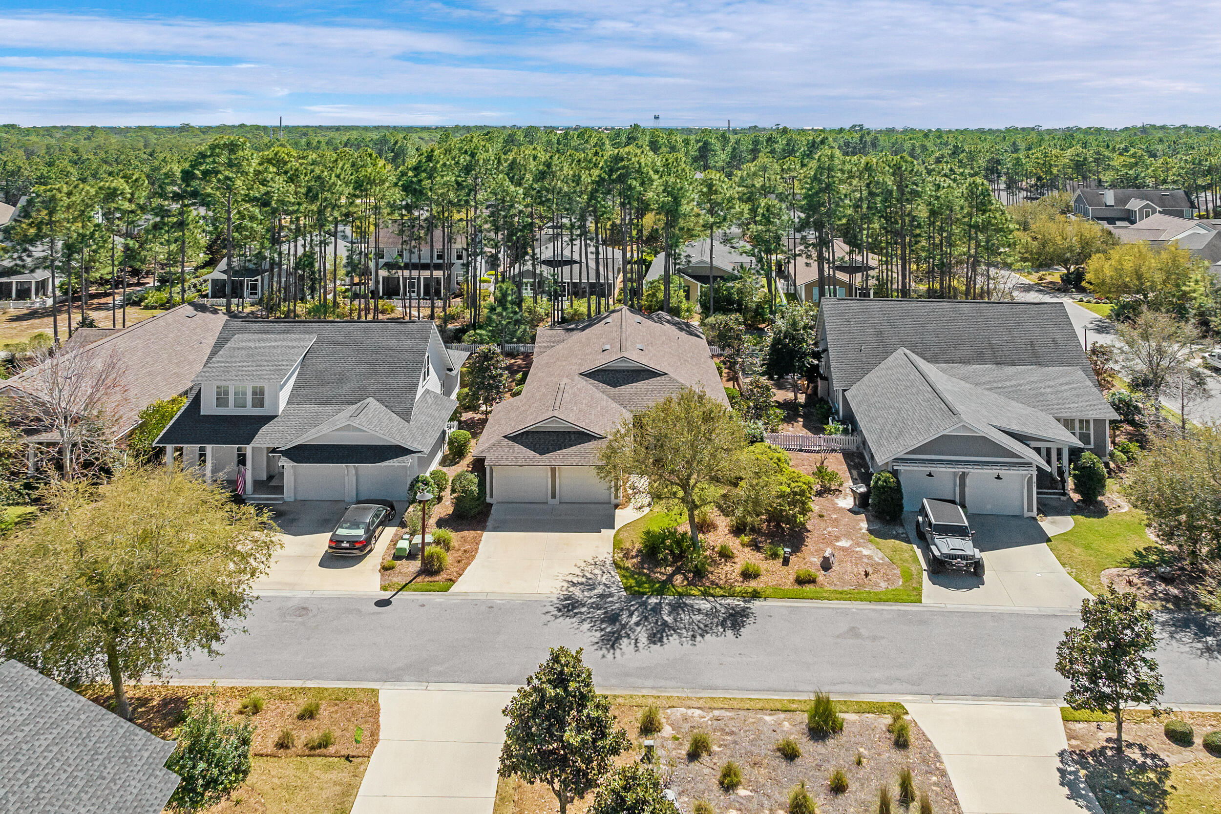 77 Cannonball Lane, Unit LOT (174) Inlet Beach, FL 32461 - Photo 44 of 46 an aerial view of a house with a yard basket ball court and outdoor seating