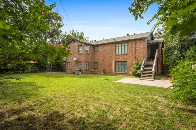 a view of a backyard with a garden and plants