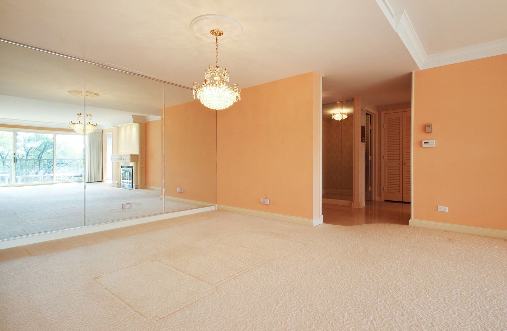 22 Park Lane, Unit 518 Park Ridge, IL 60068 - Photo 6 of 21 a view of an empty room with a chandelier fan