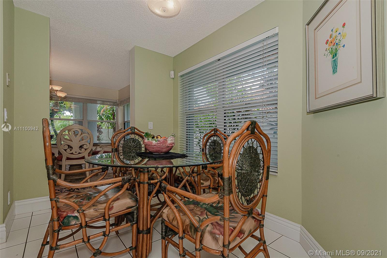 2295 Northwest 53rd Street Boca Raton, FL 33496 - Photo 9 of 25 a view of a dining room with furniture