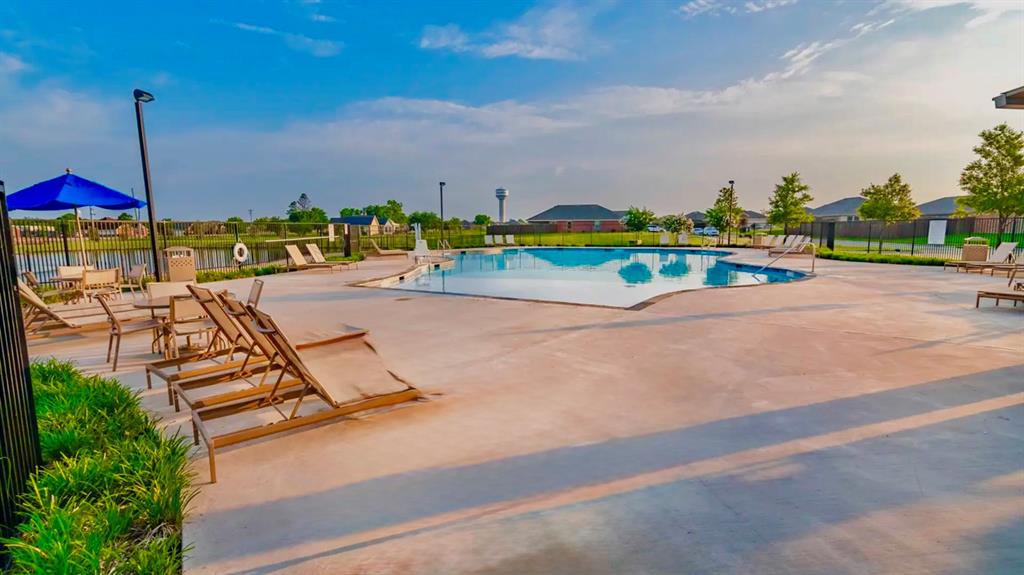 816 Country Road Royse City, TX 75189 - Photo 23 of 24 Community swimming pool featuring a freeform design and ample surrounding concrete decking