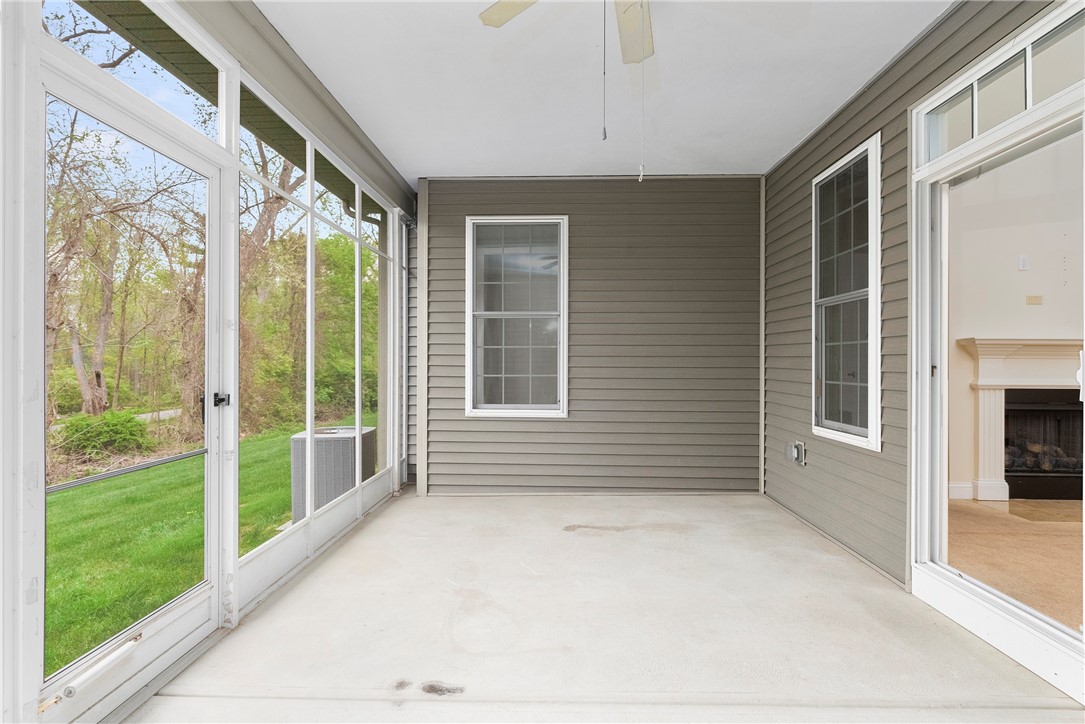 315 Old River Road, Unit 11 Lincoln, RI 02838 - Photo 12 of 27 Private screen porch with wooded views