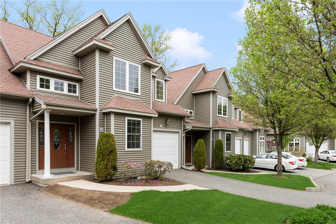 315 Old River Road, Unit 11 Lincoln, RI 02838 - Photo 2 of 27 Exterior front with private entrance and garage.