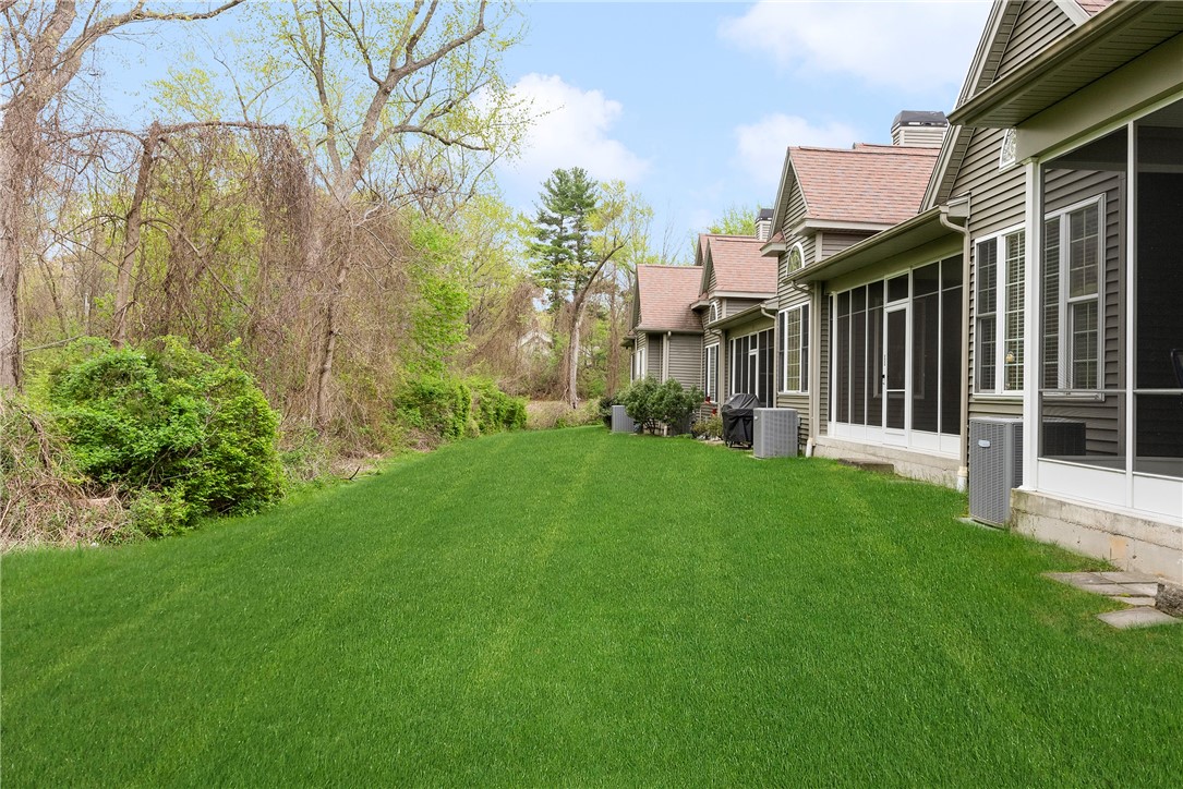 315 Old River Road, Unit 11 Lincoln, RI 02838 - Photo 25 of 27 Back yard