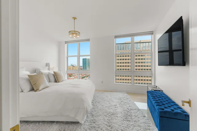 a bathroom with a sink a shower and a mirror