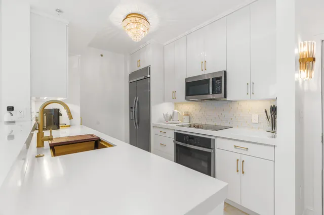 a kitchen with a stove and a microwave