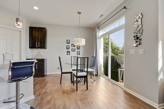 2816 Church Road Aurora, IL 60502 - Photo 9 of 20 a view of a dining room with furniture window and wooden floor
