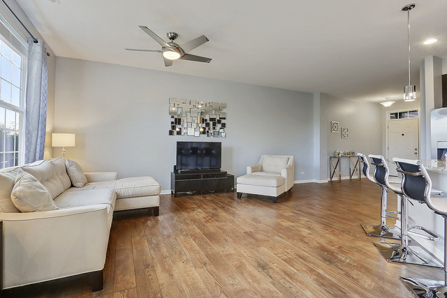 2816 Church Road Aurora, IL 60502 - Photo 10 of 20 a living room with furniture and wooden floor