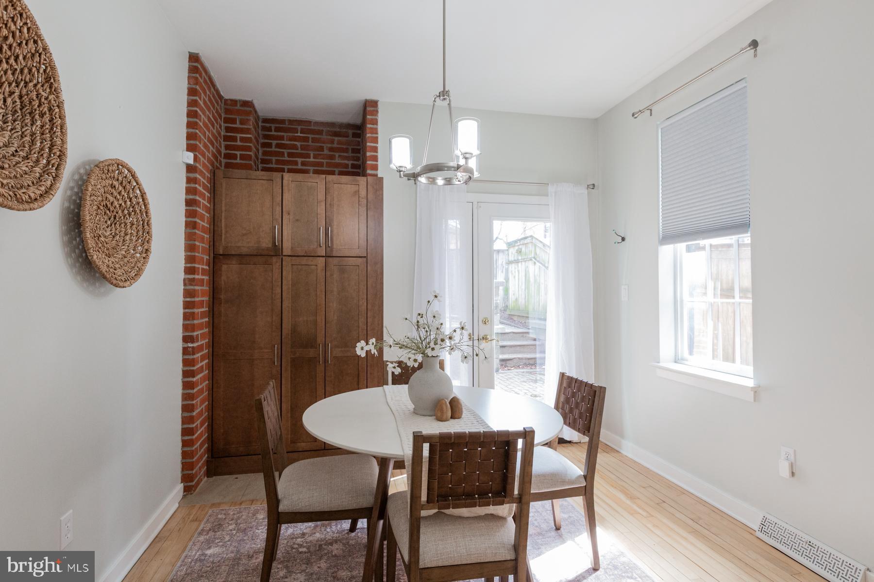 137 South Duke Street Lancaster, PA 17602 - Photo 17 of 51 a view of a dining room with furniture and chandelier