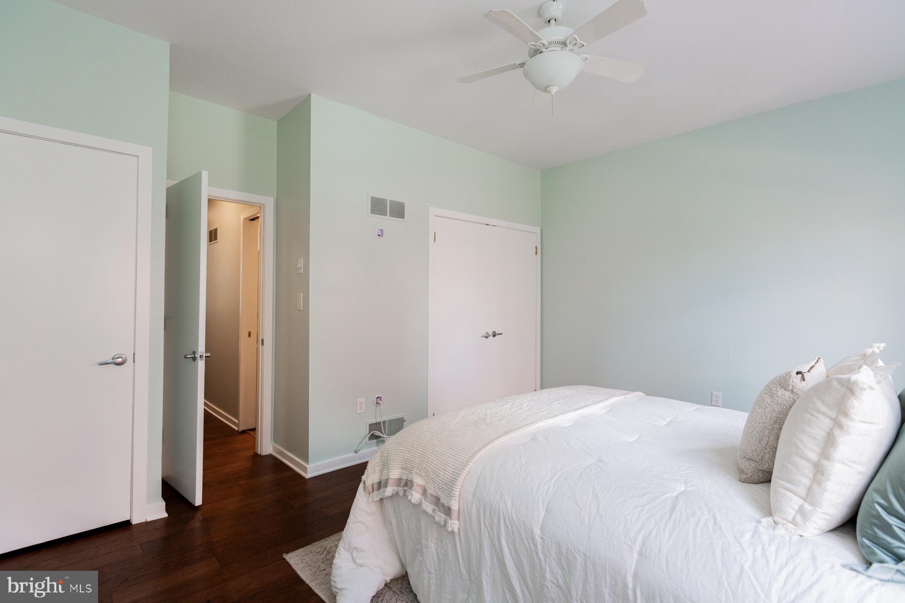 137 South Duke Street Lancaster, PA 17602 - Photo 29 of 51 a bedroom with a bed and wooden floor