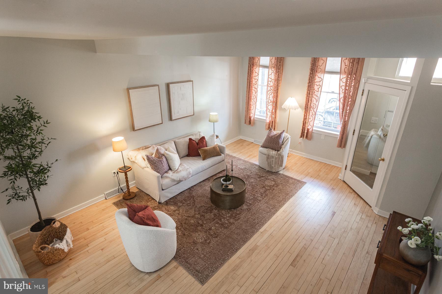 137 South Duke Street Lancaster, PA 17602 - Photo 6 of 51 a living room with furniture and a large window