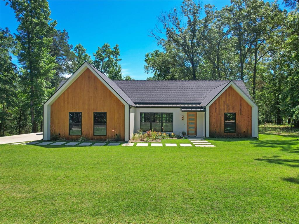 800 John Dean Road Gilmer, TX 75644 - Photo 2 of 40 a view of a house with a yard