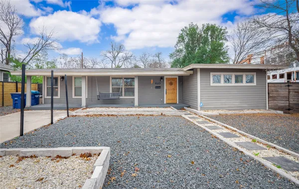 a house view with a backyard space