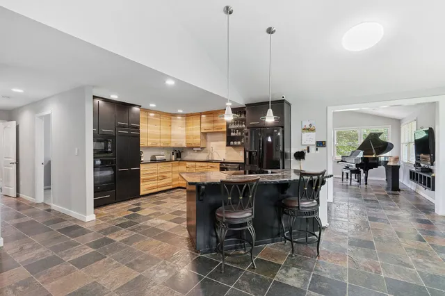 a view of a house with a street from a garden