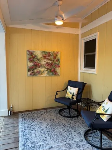 a bedroom with bed and a window