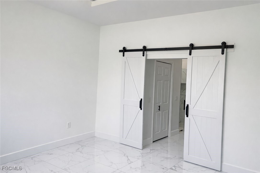 3903 11th Street Southwest Lehigh Acres, FL 33976 - Photo 9 of 12 a view of a bathroom