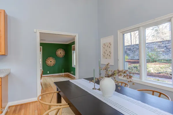 a large kitchen with stainless steel appliances granite countertop a stove and a refrigerator