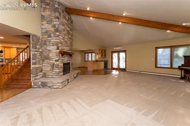 a view of empty room with windows