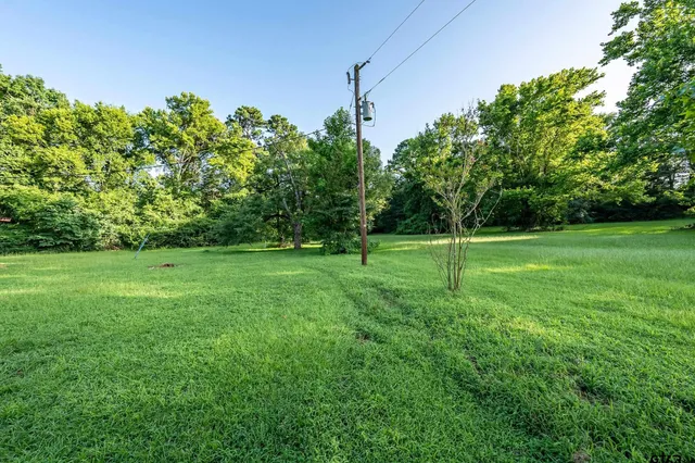 a workspace with furniture and a chandelier