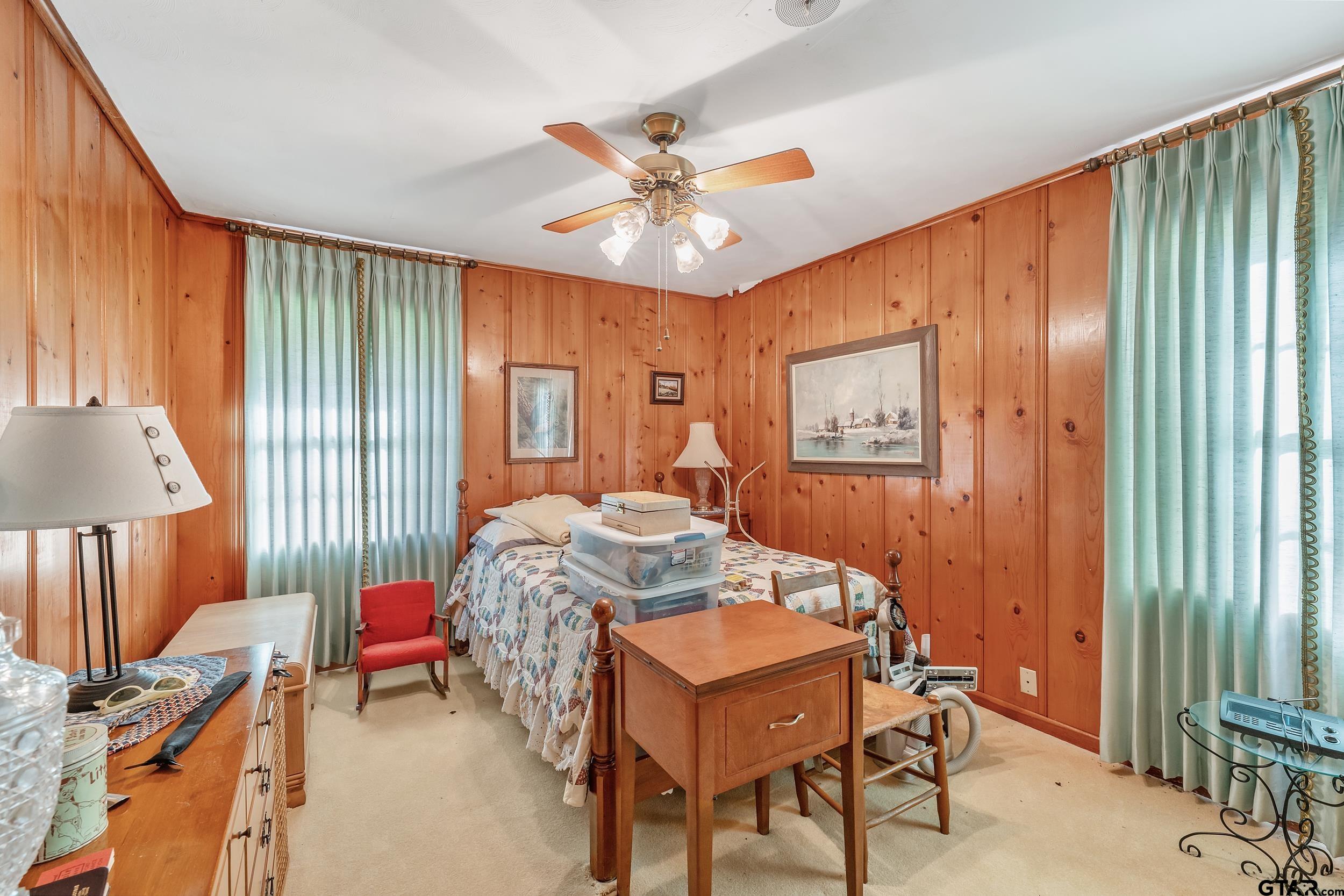 1858 Dickinson Drive Rusk, TX 75785 - Photo 13 of 35 a workspace with furniture and a chandelier