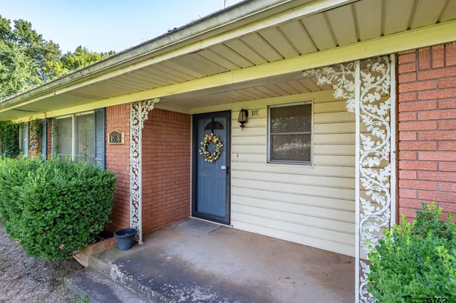 a view of a house with a swimming pool