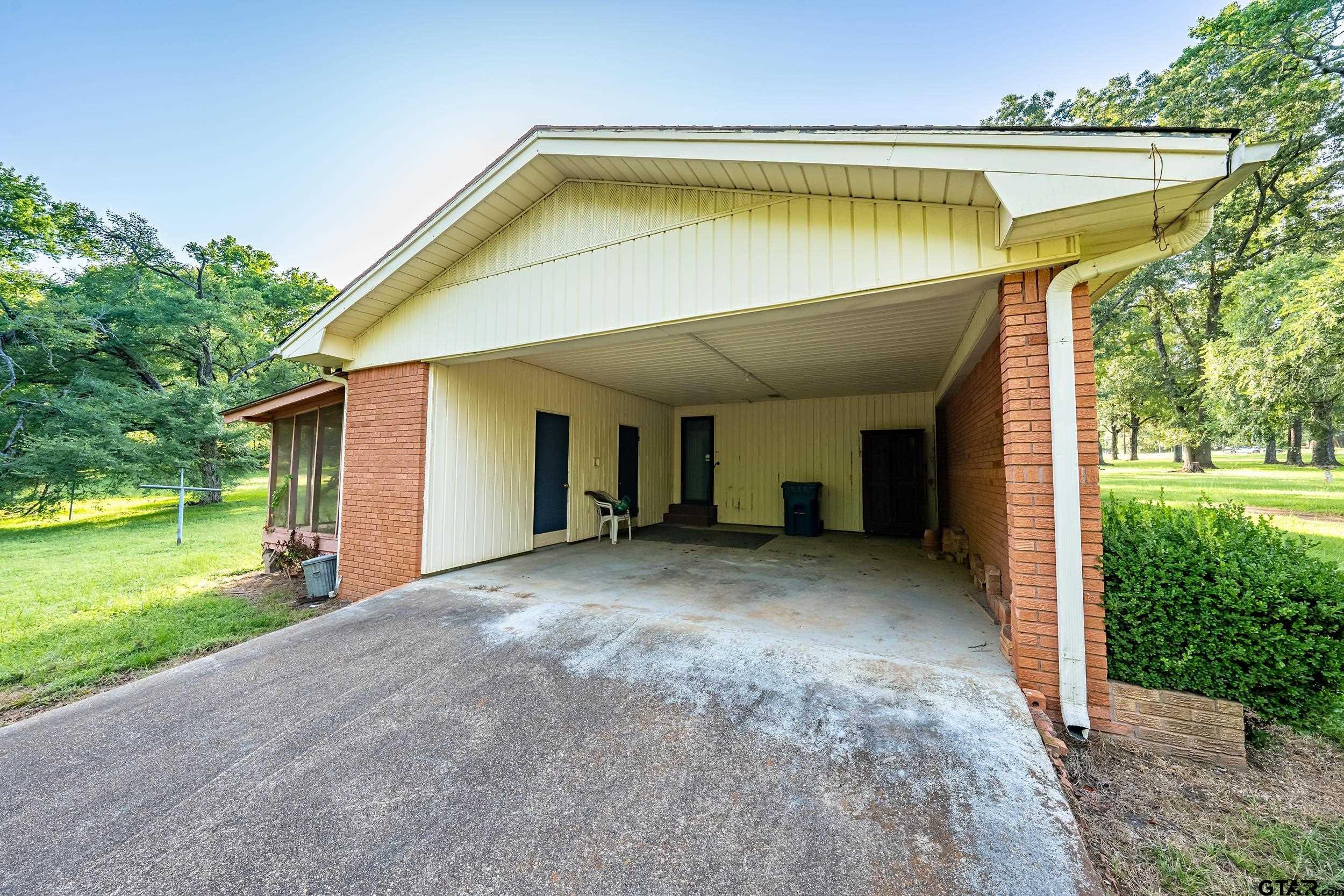 1858 Dickinson Drive Rusk, TX 75785 - Photo 9 of 35 a view of a house with a swimming pool
