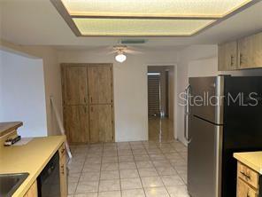 8873 Tami Street Seminole, FL 33772 - Photo 8 of 26 a view of a storage & utility room with a sink