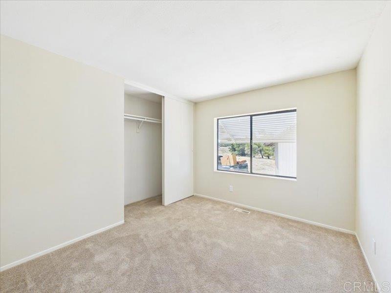 37589 Montezuma Valley Road Ranchita, CA 92066 - Photo 10 of 43 an empty room with windows and closet