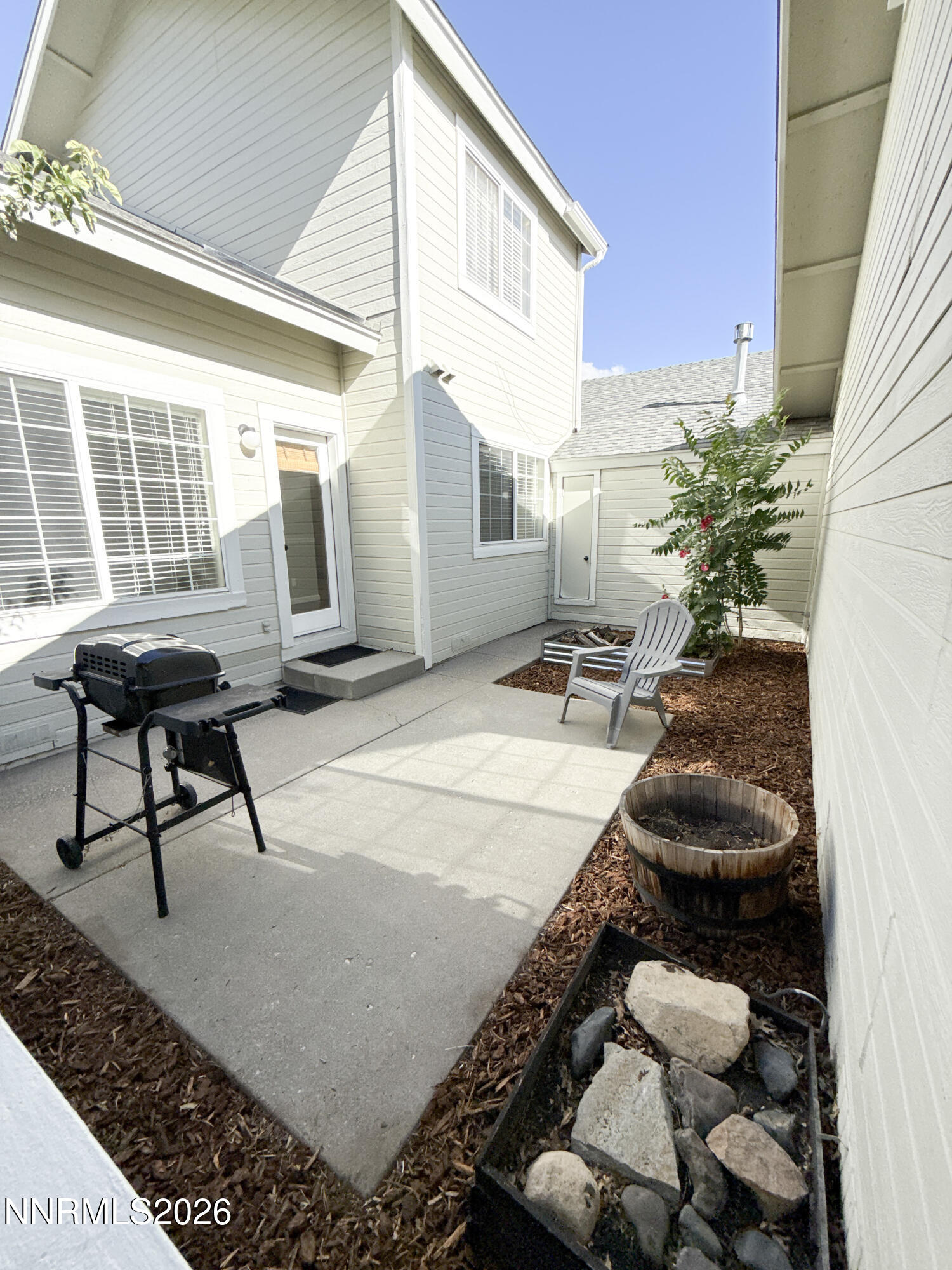 1899 Tuolumne Drive Reno, NV 89523 - Photo 27 of 44 a view of a porch with furniture and a potted plant