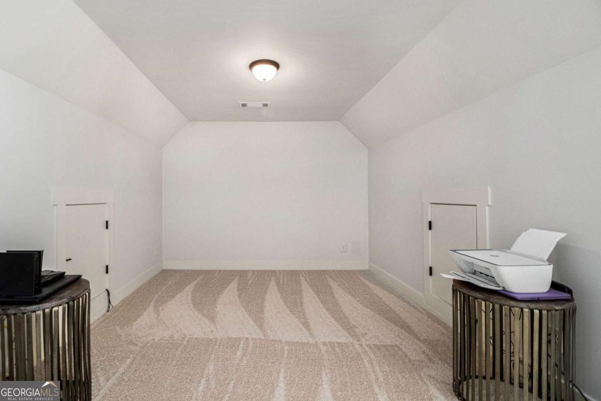 466 Austin Storey Circle Newnan, GA 30263 - Photo 19 of 39 a view of an empty room