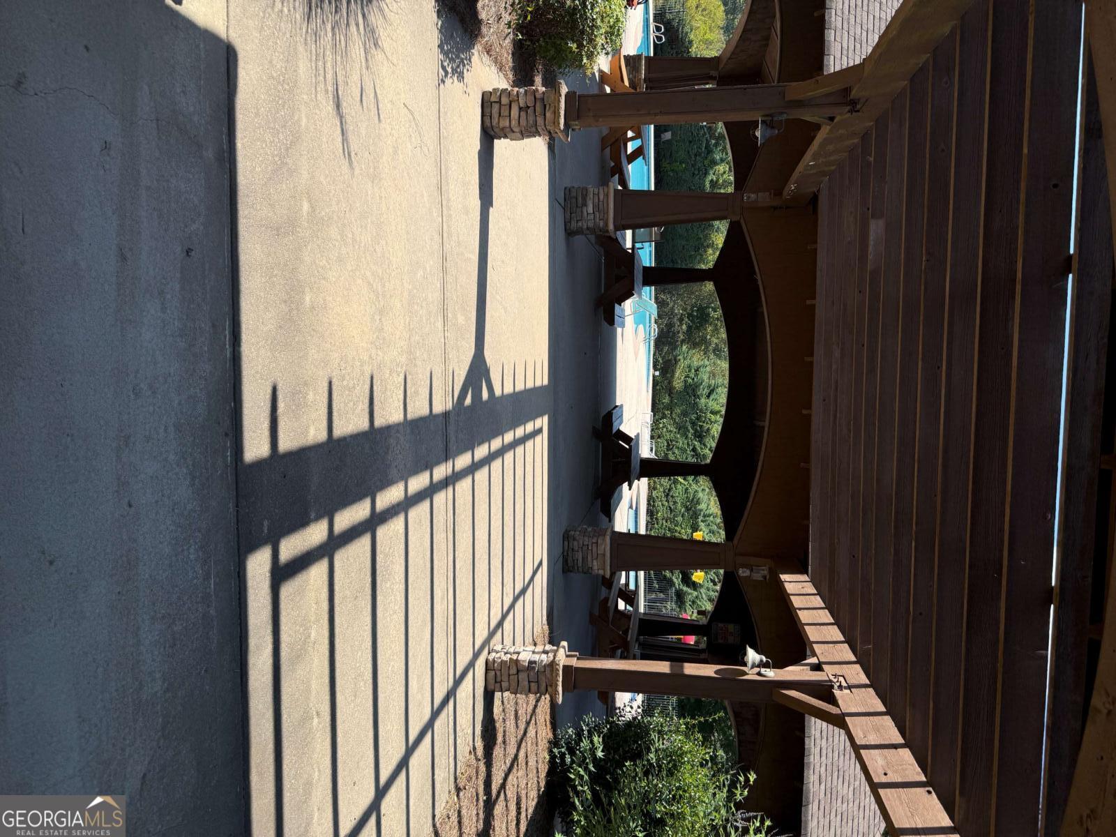 466 Austin Storey Circle Newnan, GA 30263 - Photo 35 of 39 a view of balcony and wooden floor