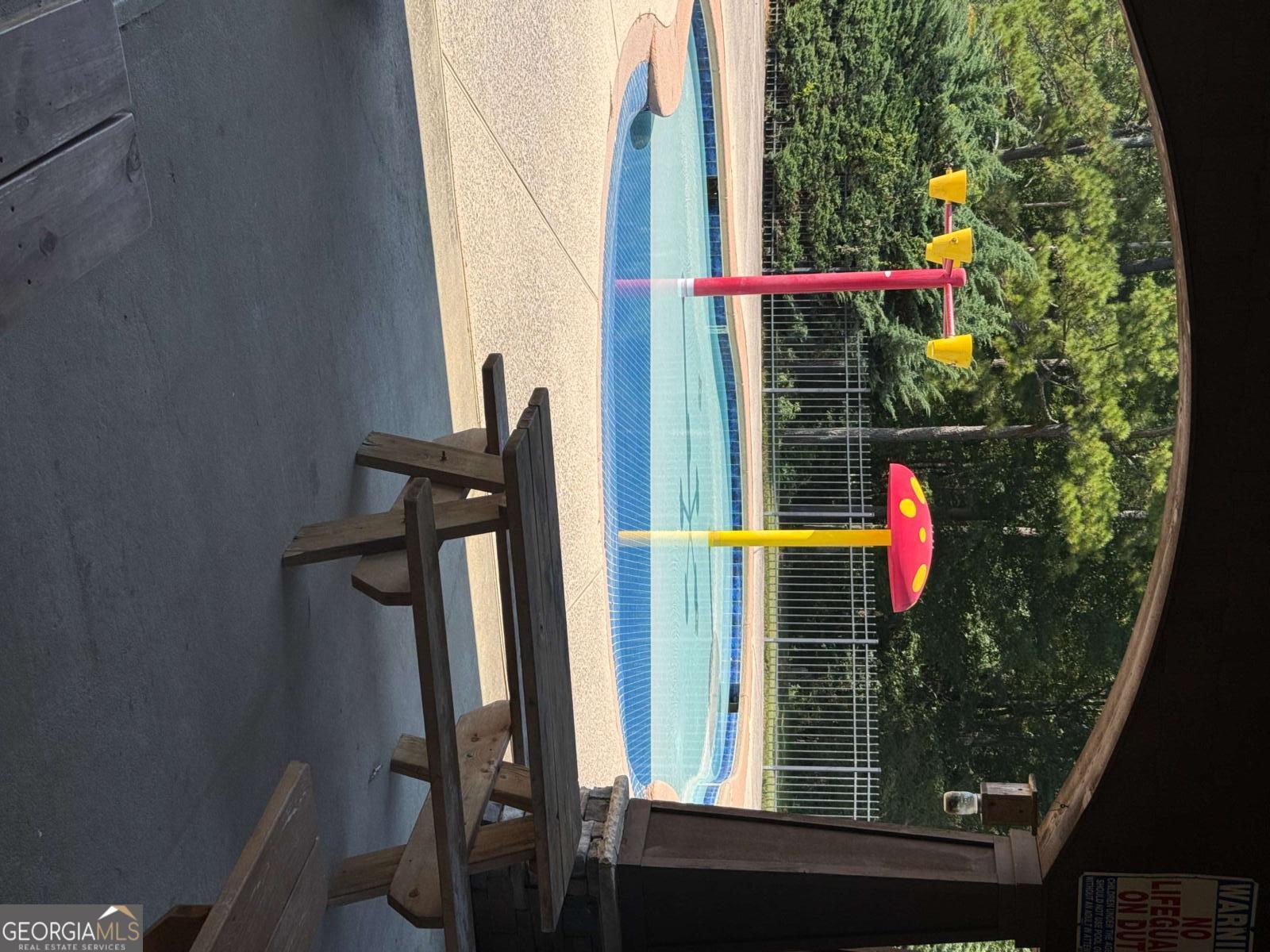 466 Austin Storey Circle Newnan, GA 30263 - Photo 36 of 39 a view of a balcony with couch
