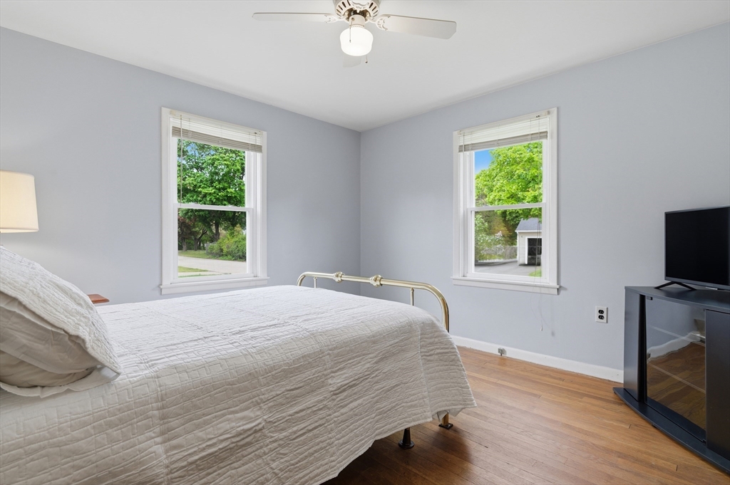188 Glendale Road Attleboro, MA 02703 - Photo 13 of 37 a bedroom with a bed a window and a television