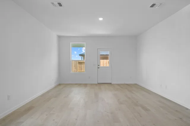 an empty room with a window