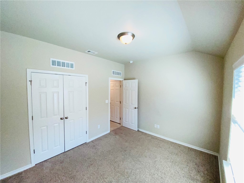 2270 Tallow Drive Portland, TX 78374 - Photo 12 of 38 an empty room with an entryway and closet