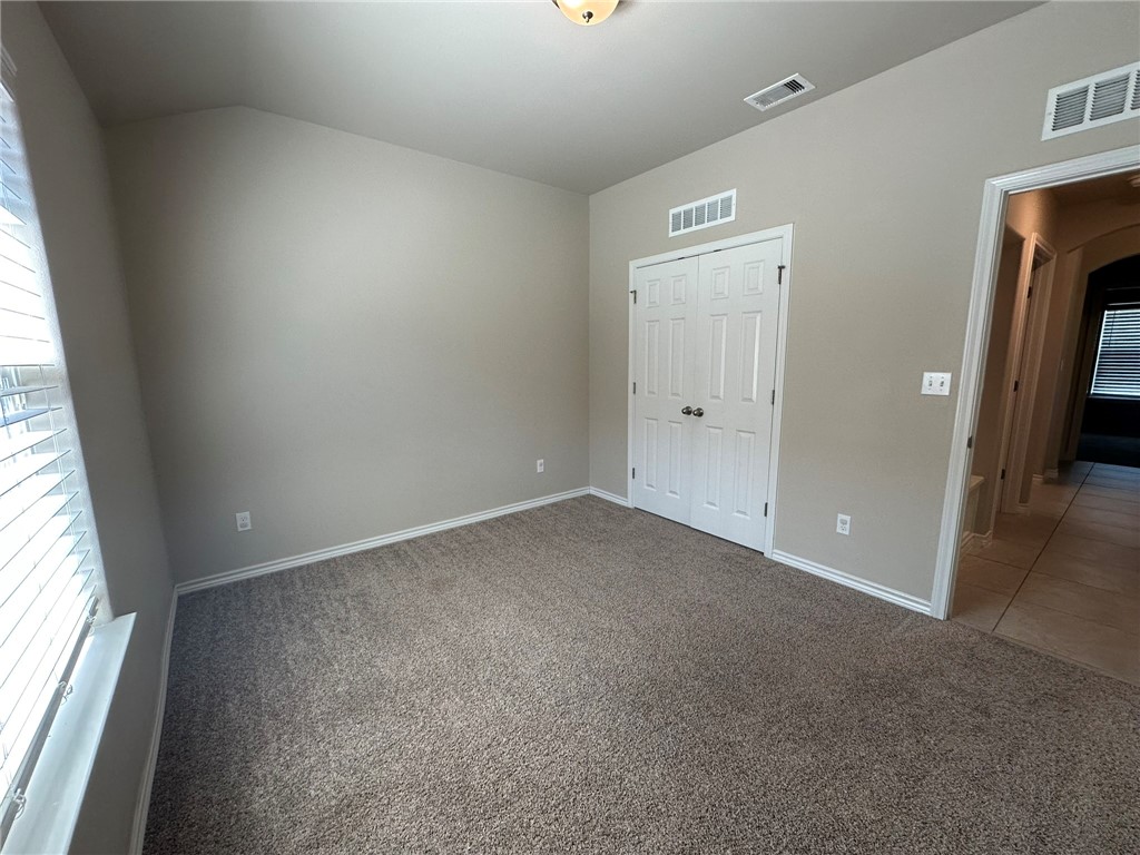2270 Tallow Drive Portland, TX 78374 - Photo 21 of 38 an empty room with windows and entrance