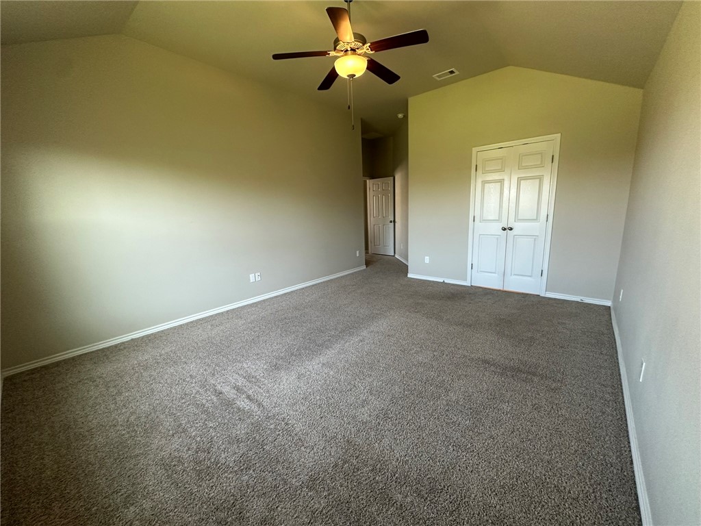 2270 Tallow Drive Portland, TX 78374 - Photo 23 of 38 en empty room with windows and fan