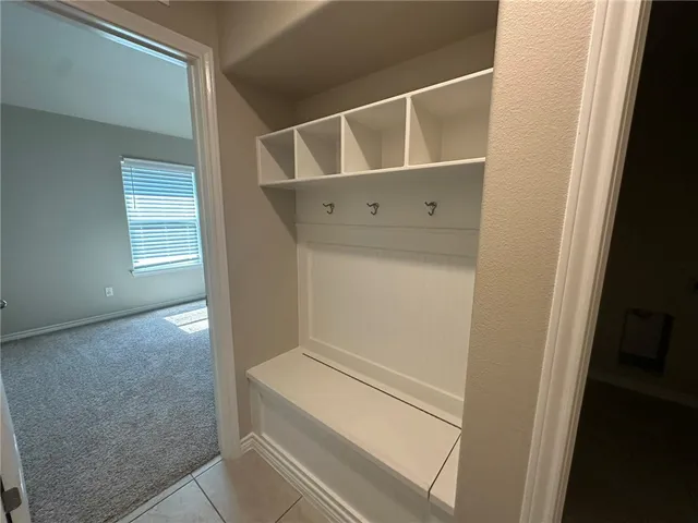 a view of an empty walk in closet