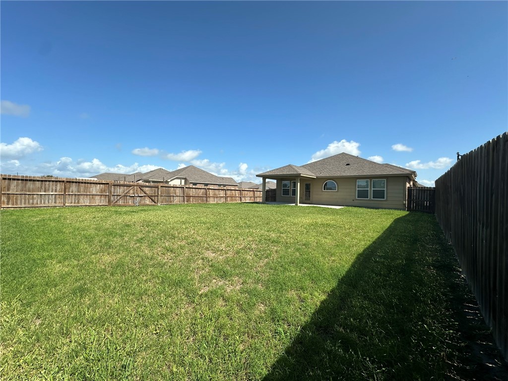 2270 Tallow Drive Portland, TX 78374 - Photo 36 of 38 a front view of a house with garden