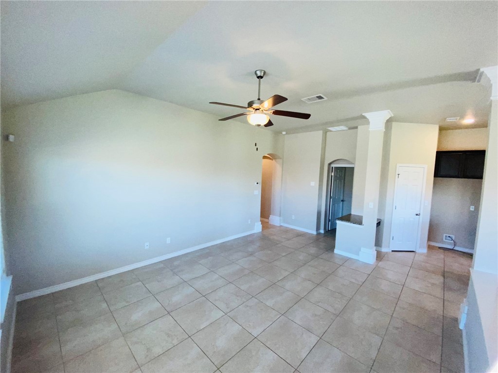 2270 Tallow Drive Portland, TX 78374 - Photo 8 of 38 an empty room with a white walls and ceiling fan