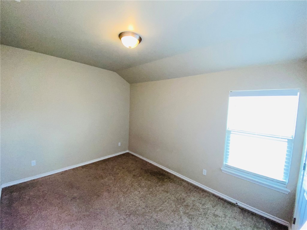 2270 Tallow Drive Portland, TX 78374 - Photo 10 of 38 an empty room with a window