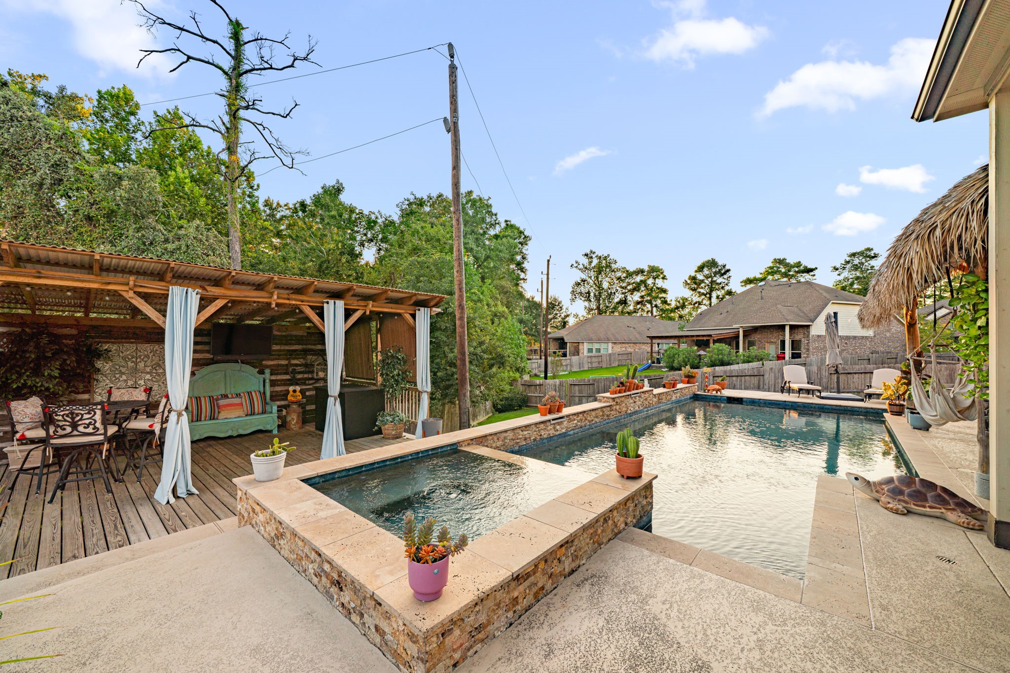 931 South Chamfer Way Crosby, TX 77532 - Photo 14 of 40 a view of a swimming pool with a lounge chairs