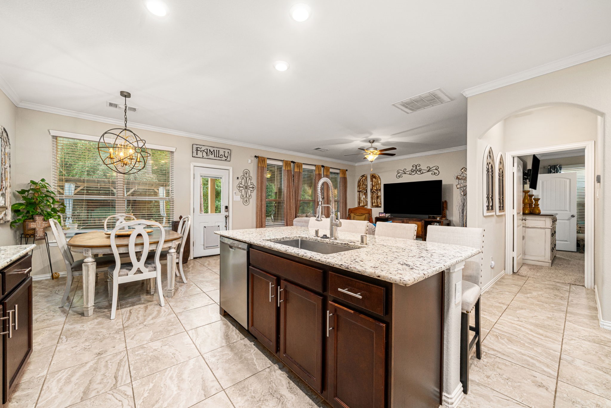 931 South Chamfer Way Crosby, TX 77532 - Photo 22 of 40 a large kitchen with a table and chairs