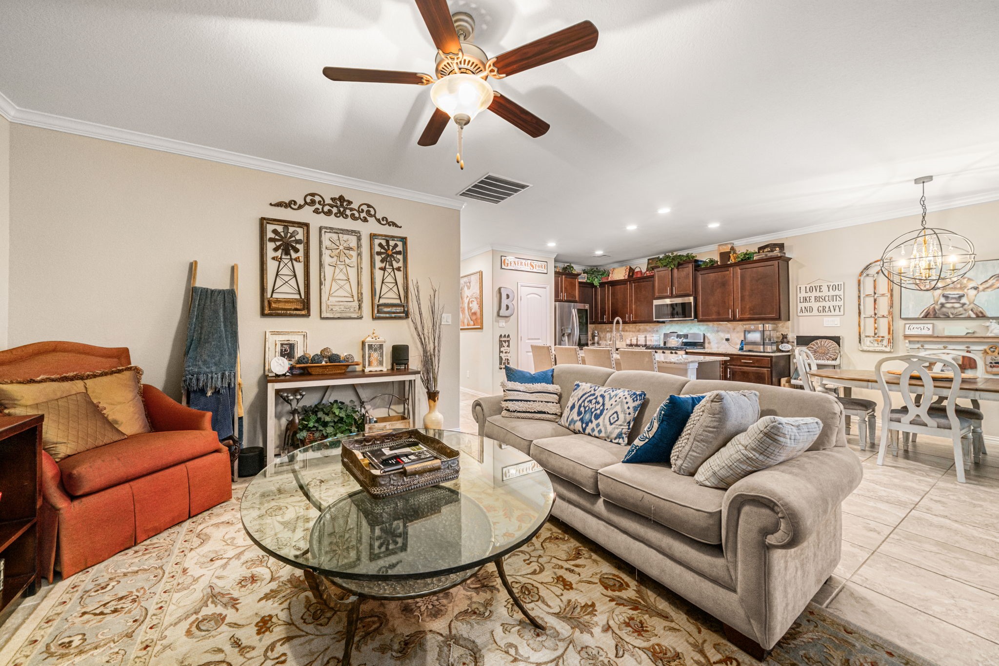 931 South Chamfer Way Crosby, TX 77532 - Photo 25 of 40 a living room with furniture kitchen view and a chandelier