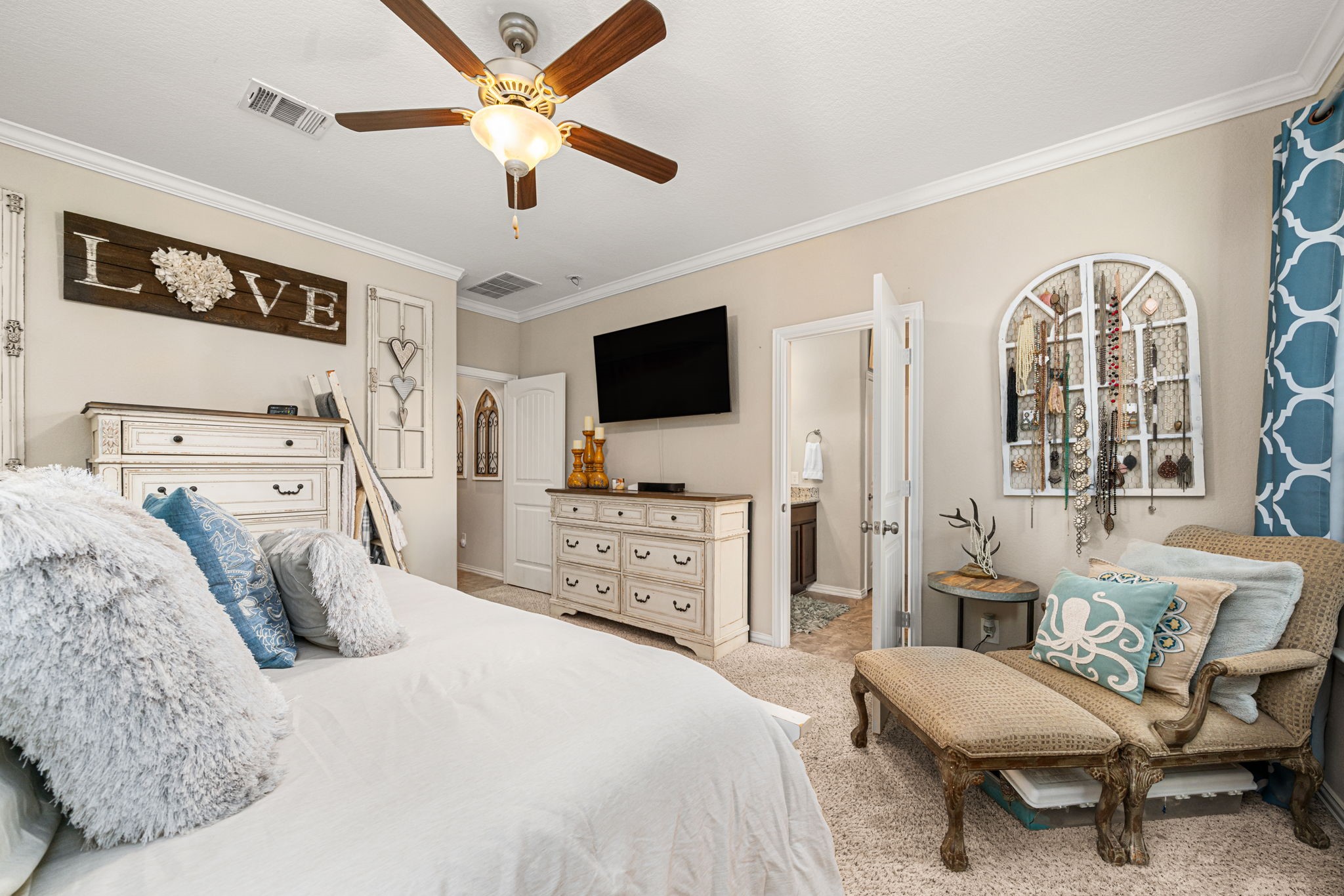 931 South Chamfer Way Crosby, TX 77532 - Photo 27 of 40 a bedroom with a bed and a flat screen tv
