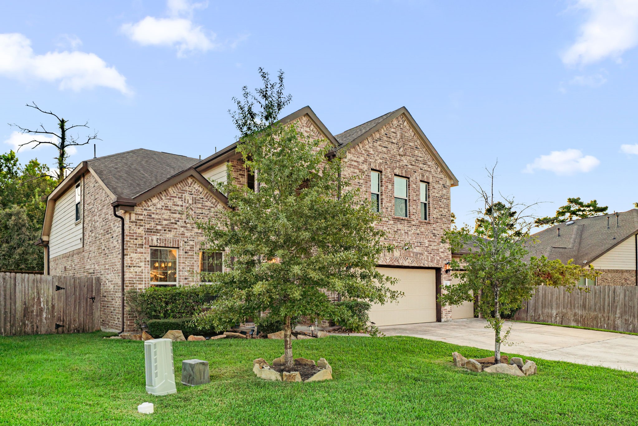 931 South Chamfer Way Crosby, TX 77532 - Photo 3 of 40 a front view of a house with a yard and garage